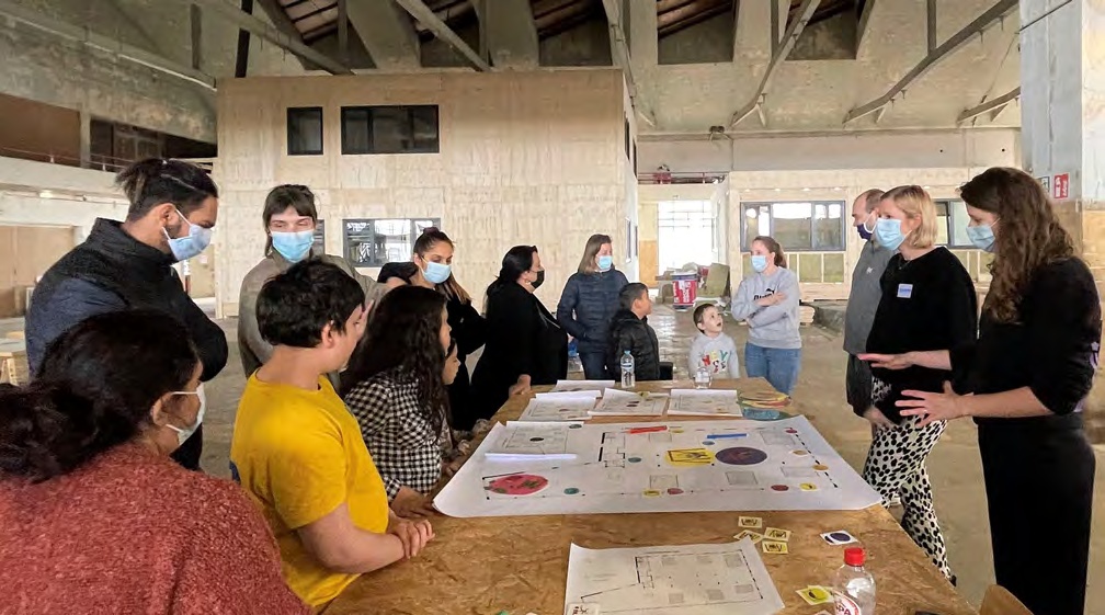 WoonBox residents and partners discussing collective spaces